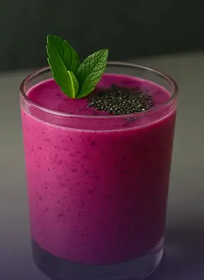 Dragon fruit smoothie with mint garnish